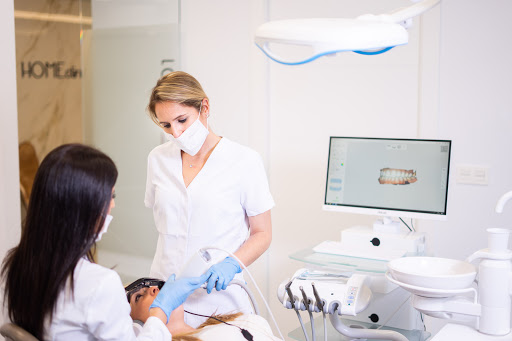 Home Clinic / Expertos en Implantes Dentales